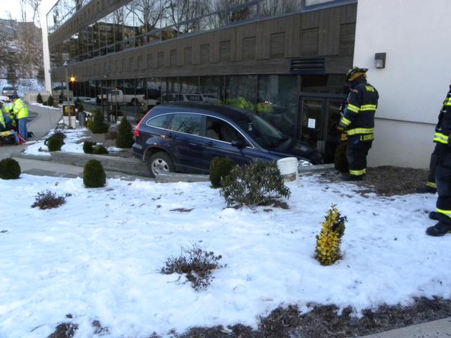 Car into building South Bedford Rd.